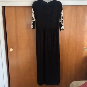 Softest cotton black dress. Stunning arm detail.